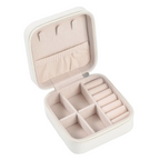 Beige jewelry case with compartments on a white background