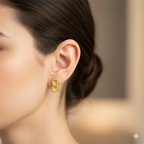 Close-up of a woman's ear wearing gold infinity stud earring, elegant jewelry style