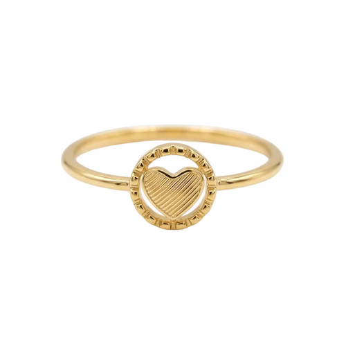 Gold ring with a heart design on a white background