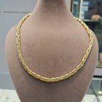 Gold chain necklace on a mannequin bust with weight and length information.