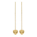 Gold heart-shaped earrings on a white background