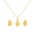 Gold hamsa hand necklace and earrings on a white background