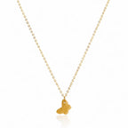 Gold necklace with a small pendant on a white background
