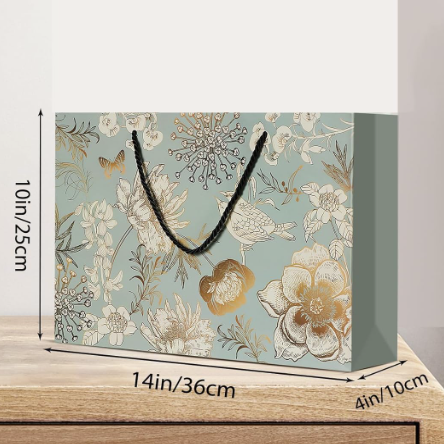 Floral-patterned paper bag with measurements on a wooden surface